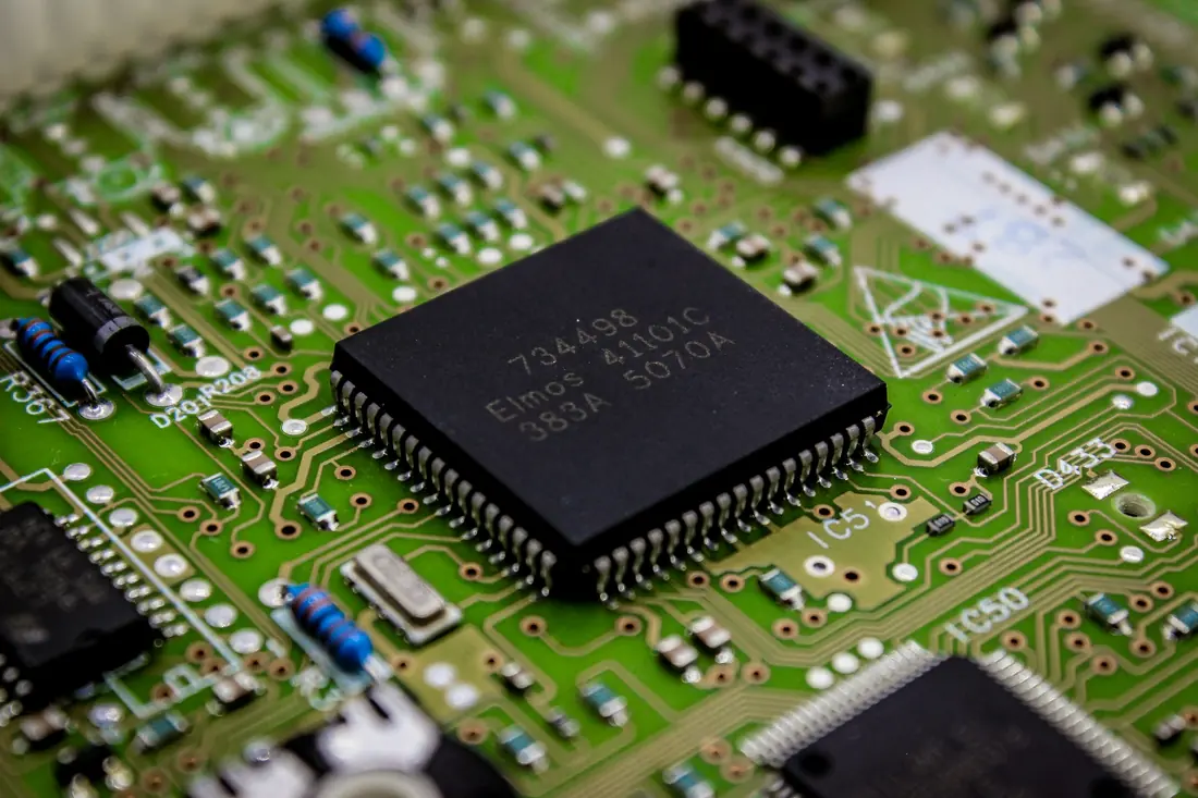 Close-up of a computer chip on a printed circuit board
